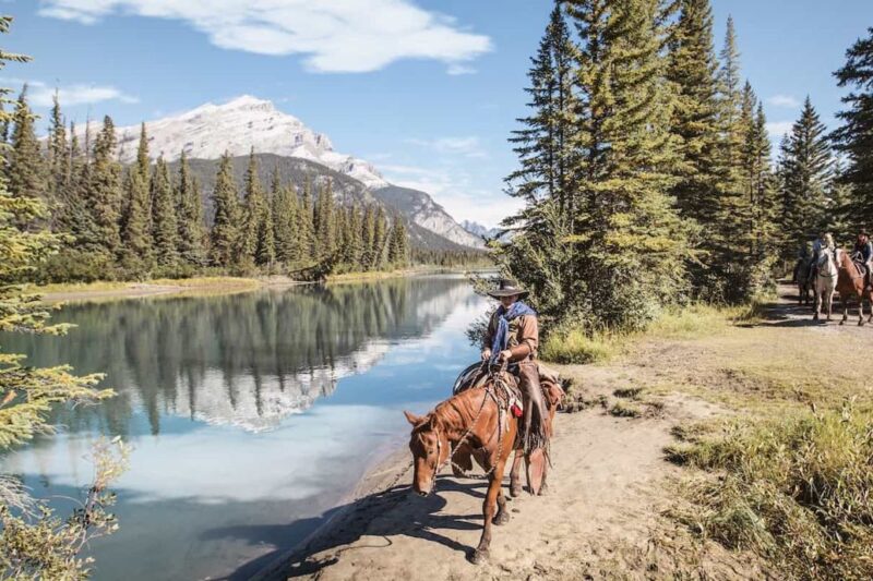 Horseback Riding along the river in the Canadian Rockies at Banff Trail Riders in Banff, British Columbia, CA