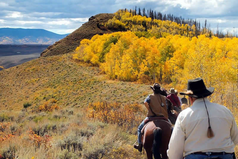 Scenic horseback riding in the Rocky Mountains at Bar Lazy J Guest Ranch in Colorado