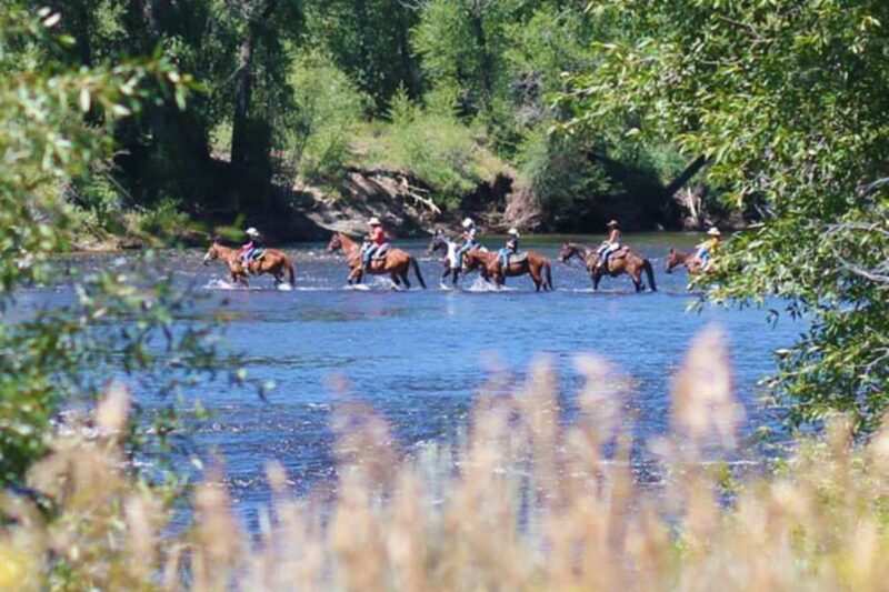 River Crossing on horseback at Bar Lazy J Guest Ranch